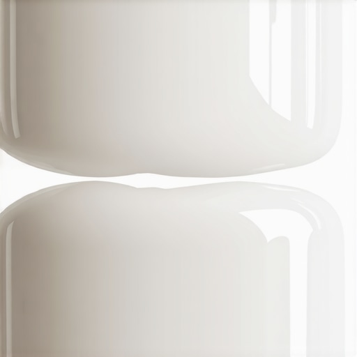 Close-up of a natural-looking porcelain veneer showing realistic light reflection and texture.
